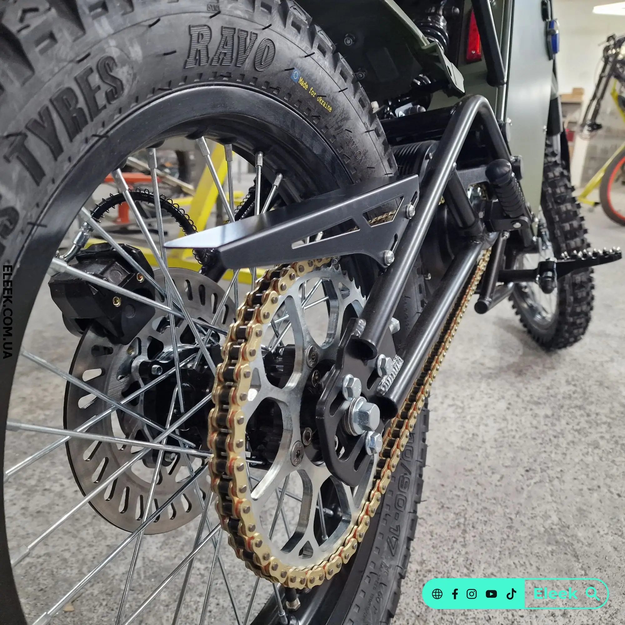 ELEEK SG-PW1 wheel sprocket guard on Positive electric bike — rear close-up view