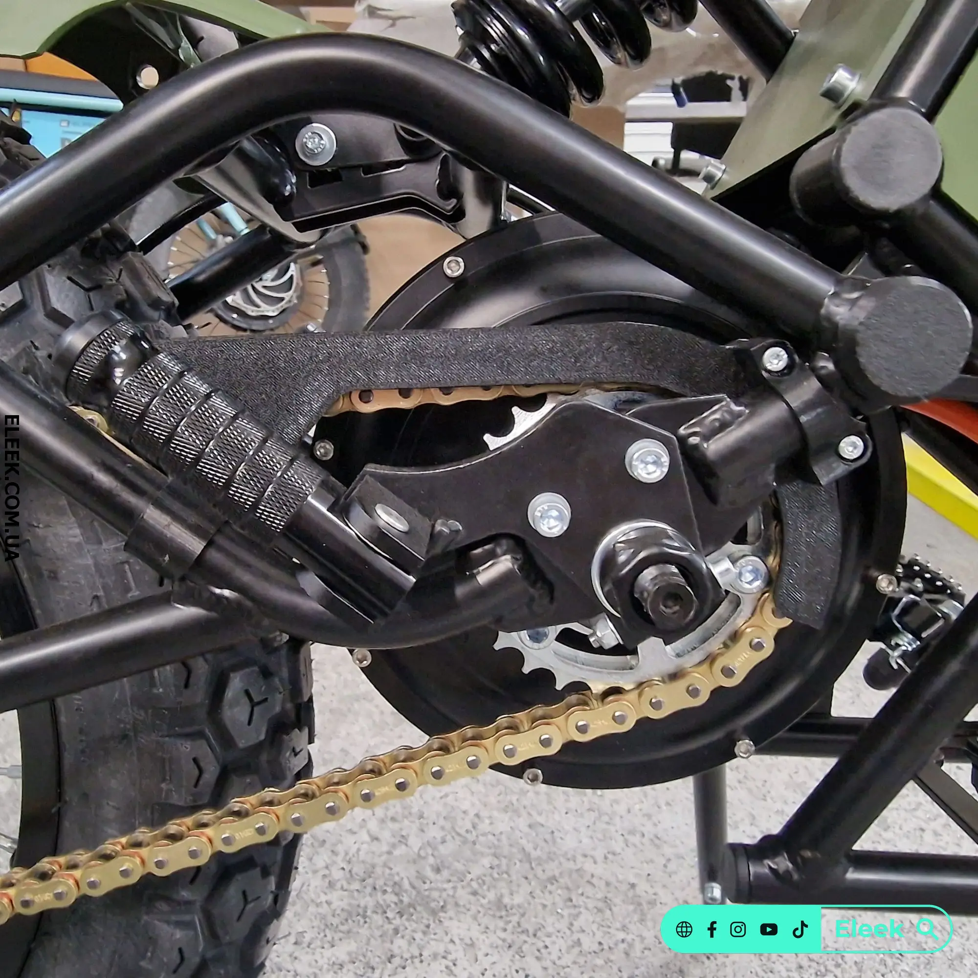 ELEEK SG-P1 electric motor sprocket guard installed on the Positive e-bike